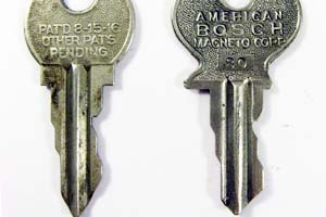 clum and american bosch logo key - reverse